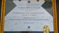 Perintah Kabupaten Nias Utara Menerima Penghargaan Dari Kementerian Keuangan RI Sebagai Kabupaten Tercepat Peringkat II Penyaluran Dana Desa (DD) TA 2024