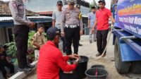 HUT Ke-69 Lalulintas Bhayangkara Bansos Air Bersih Kepada Warga