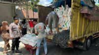 Bhabinkamtibmas Polsek Tanjung Selatan Laksanakan Pengamanan Pendistribusian Cadangan Beras Pemerintah