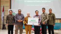 Bantuan Program Beasiswa, Henan Putihrai Sekuritas Tunaikan Sedekah Saham Nasabah melalui BAZNAS RI