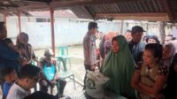 Pastikan Pendistribusian Beras Berjalan Kondusif, Polres Tanjung Balai Hadir di Lokasi Kegiatan