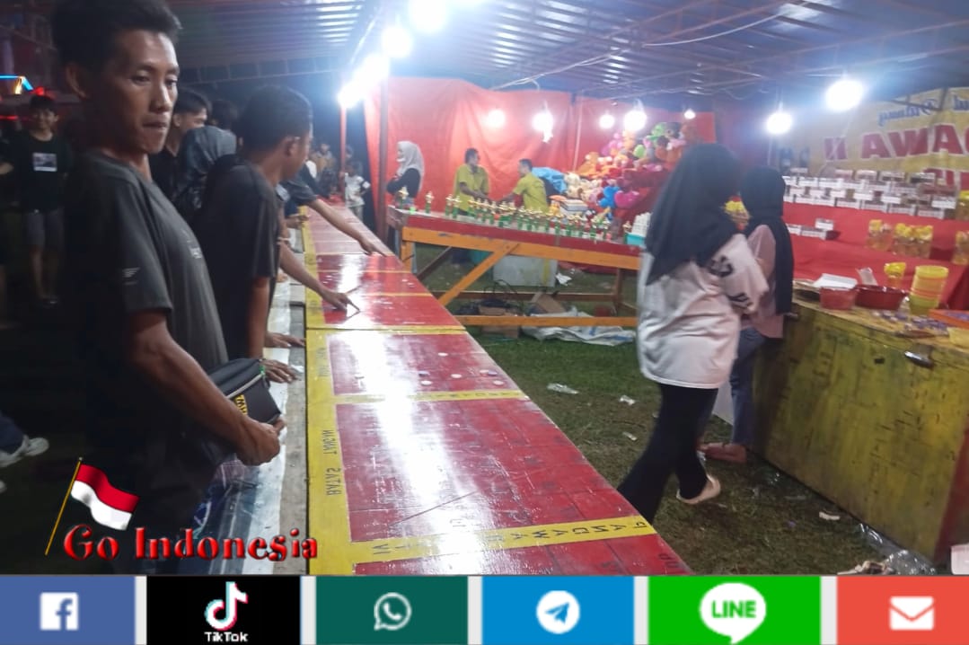 Pasar Malam di Tembesi Ada Unsur Perjudian Dipermainan Bola Gelinding