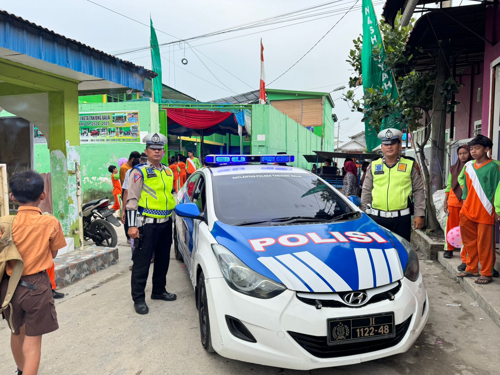 Polres Tanjung Balai Laksanakan Pengamanan Pawai Wisuda Khatam Qur'an ke XX MTs.S Al Washliyah